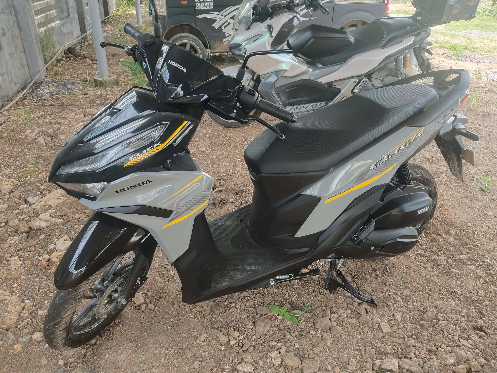 Honda Click 125 scooter with a top box