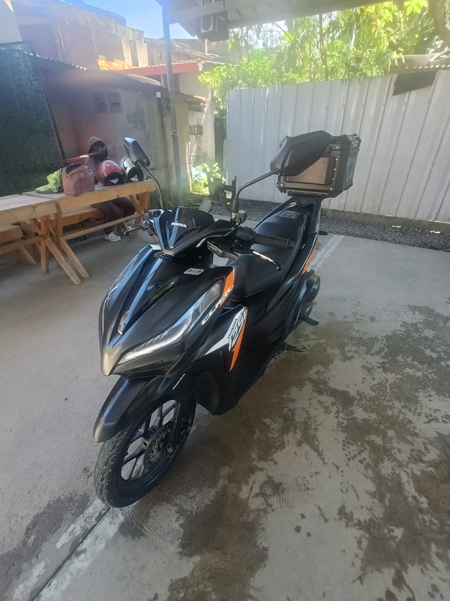 Honda Click 125 scooter with a top box